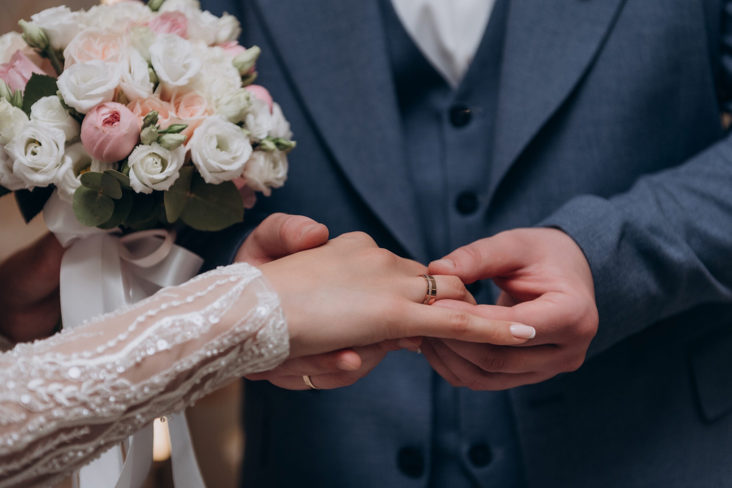The,Bride,Wears,A,Wedding,Ring,To,The,Groom,At